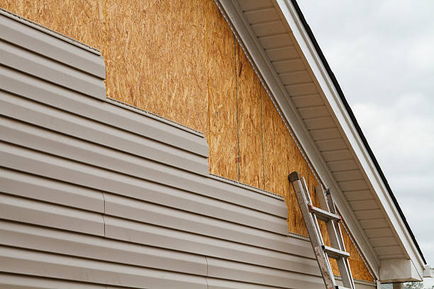 Professional Siding Installation technician working in Pisgah Forest, NC